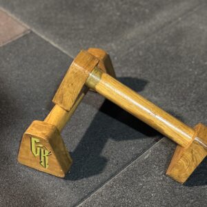 A pair of Mini Wooden Parallettes with Calikeeda Logo